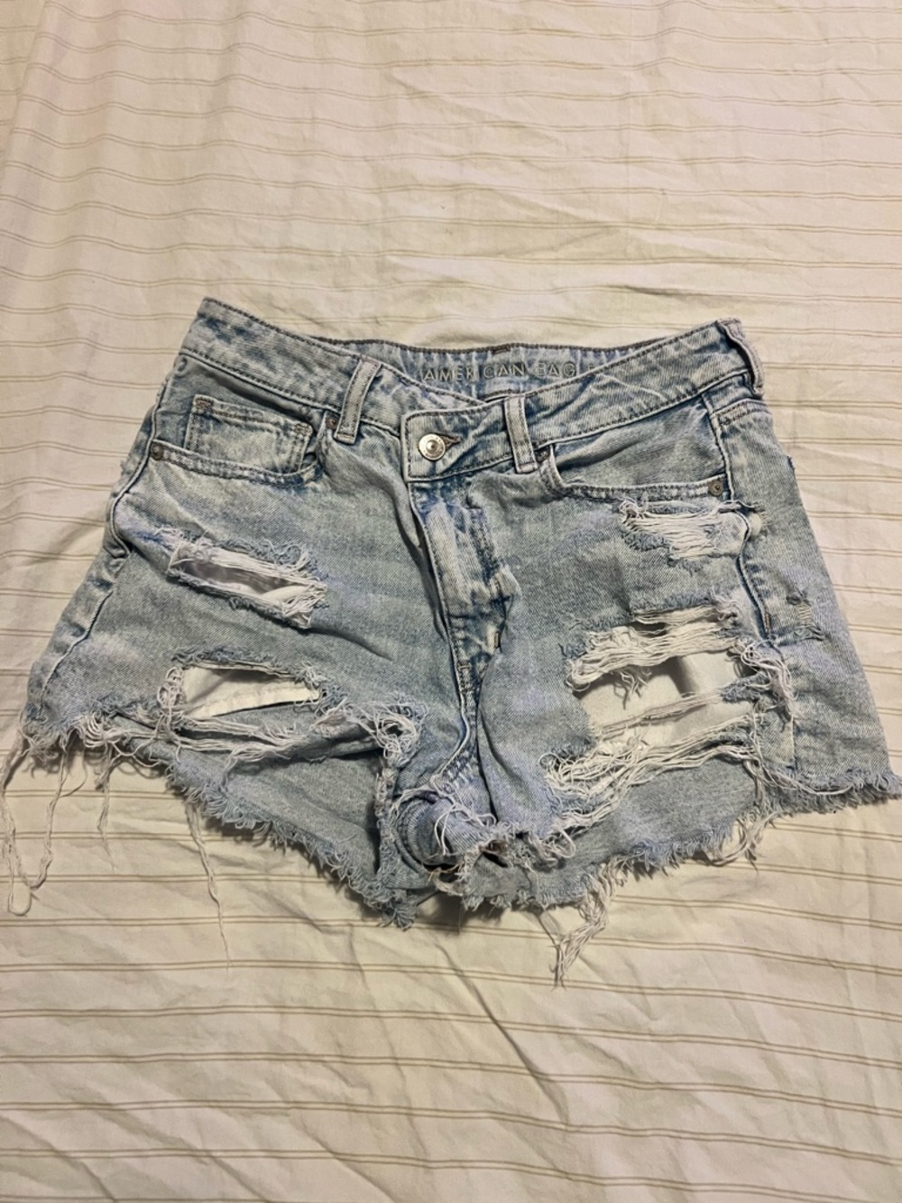 American Eagle Outfitters High Waisted Light Blue Distressed Denim Cutoff Shorts